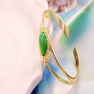 gold-tone green amethyst cuff bracelets
